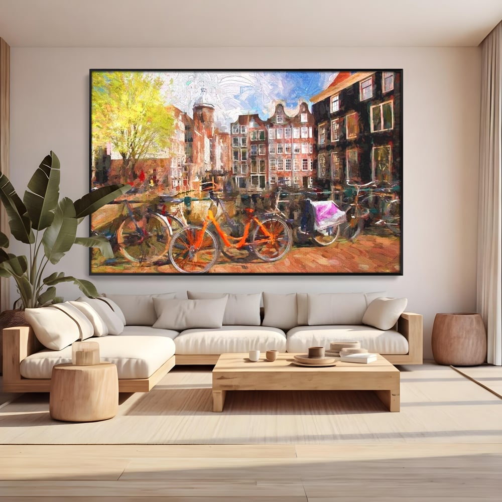 Tablou canvas cu pictura stradala cu bicicleta portocalie, in rama de aluminiu negru, pe perete intr-un living